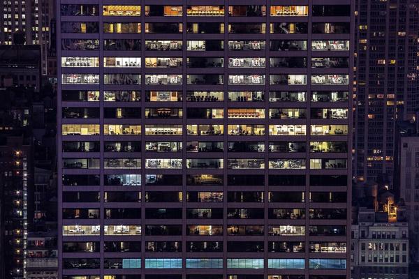 Dark atmospheric structural pillars, representing robust impenetrable enterprise security and foundation, moody lighting, no human figures
